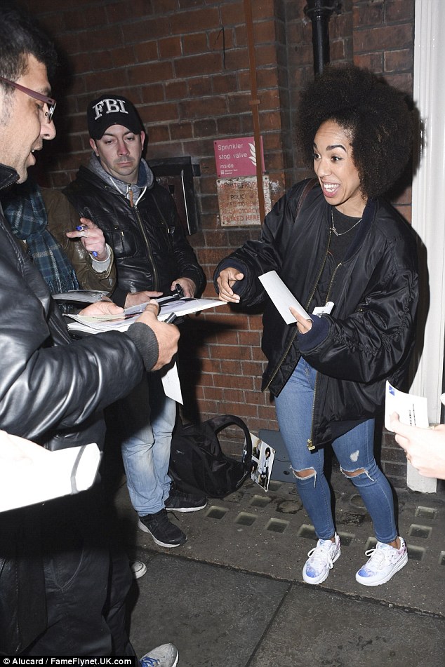 Making an impact: Pearl looked thrilled by the positive reception she received from fans, beaming as she signed autographs outside the theatre